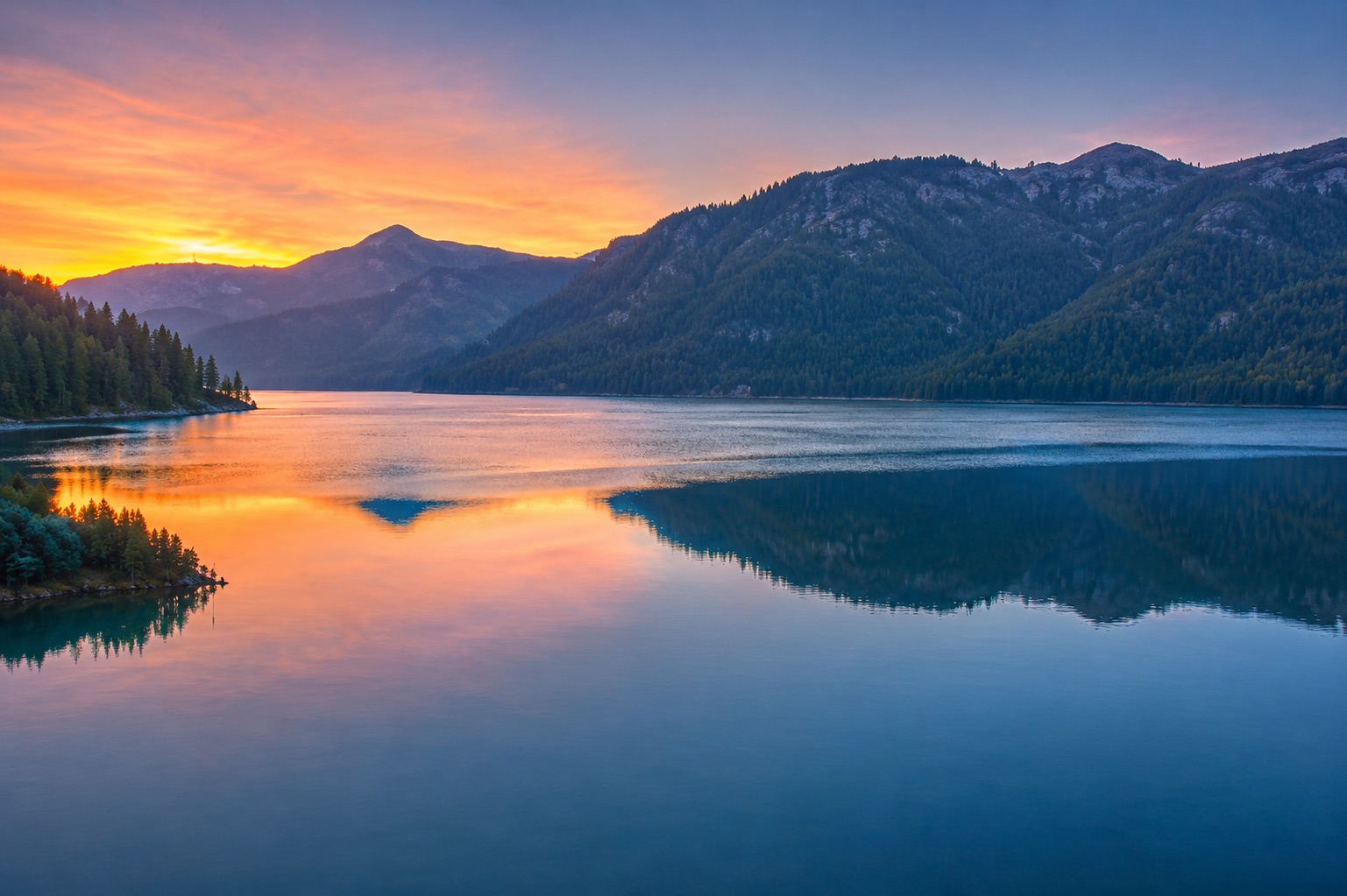 Dark sunset lake photo enhanced